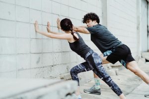 Best Stretches Before Every Workout: 12 Moves (2026)